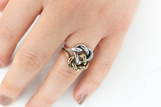 ANELLO INTRECCIO DOPPIO CUORE